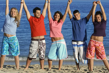 stock photo of a group of teens on the beach